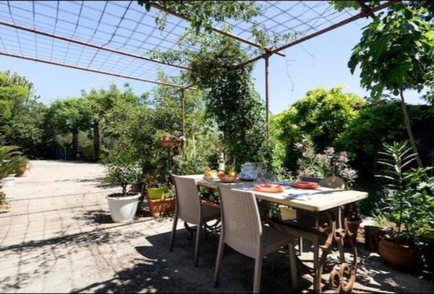 Asparano Ognina Bagian luar foto